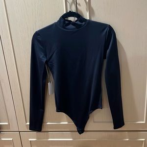 Turtleneck contour body suit